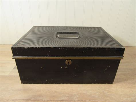 blacks in metal boxes|black metal box with lid.